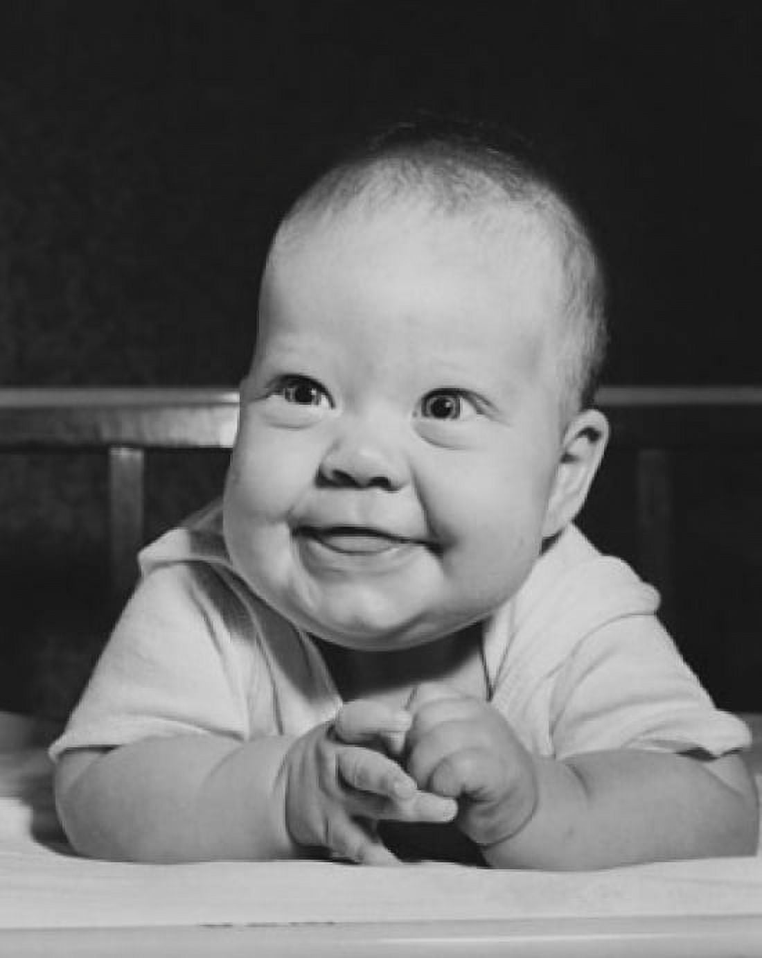 Close-up of a baby smiling in a crib Canvas Art - (18 x 24)