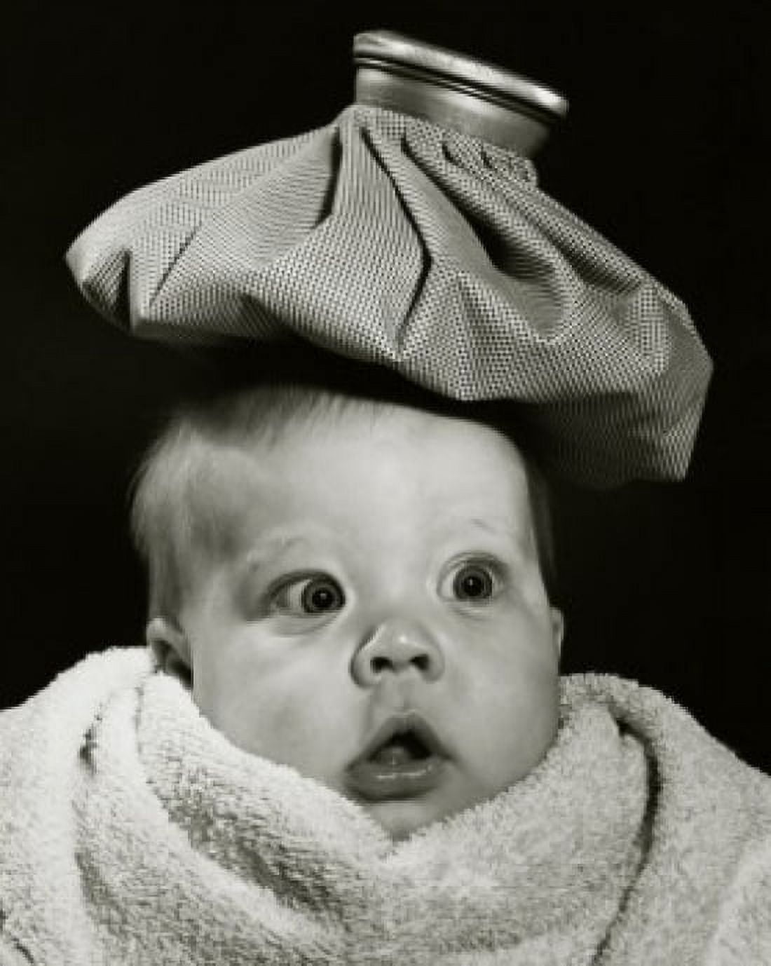 Close-up of a baby with an ice pack on his head Canvas Art -  (18 x 24)