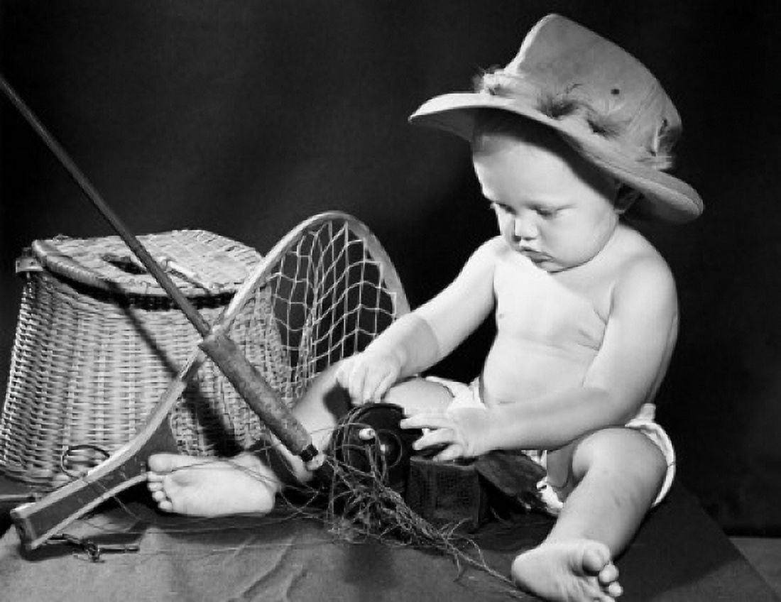 Close-up of a baby with fishing gear Canvas Art - (24 x 36)