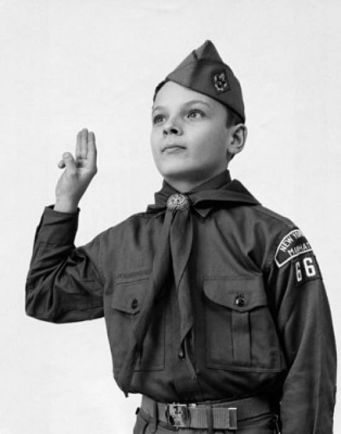 Close-up of a boy in a scout uniform saluting Canvas Art - (18 x 24)