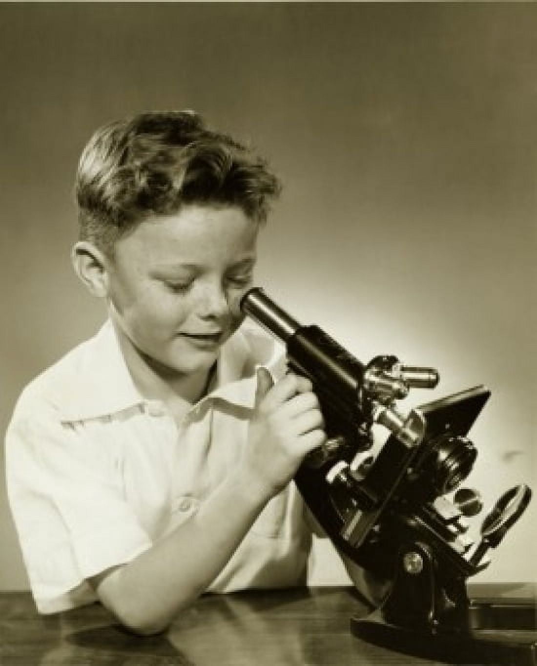 Close-up of a boy looking through a microscope Canvas Art - (24 x 36)