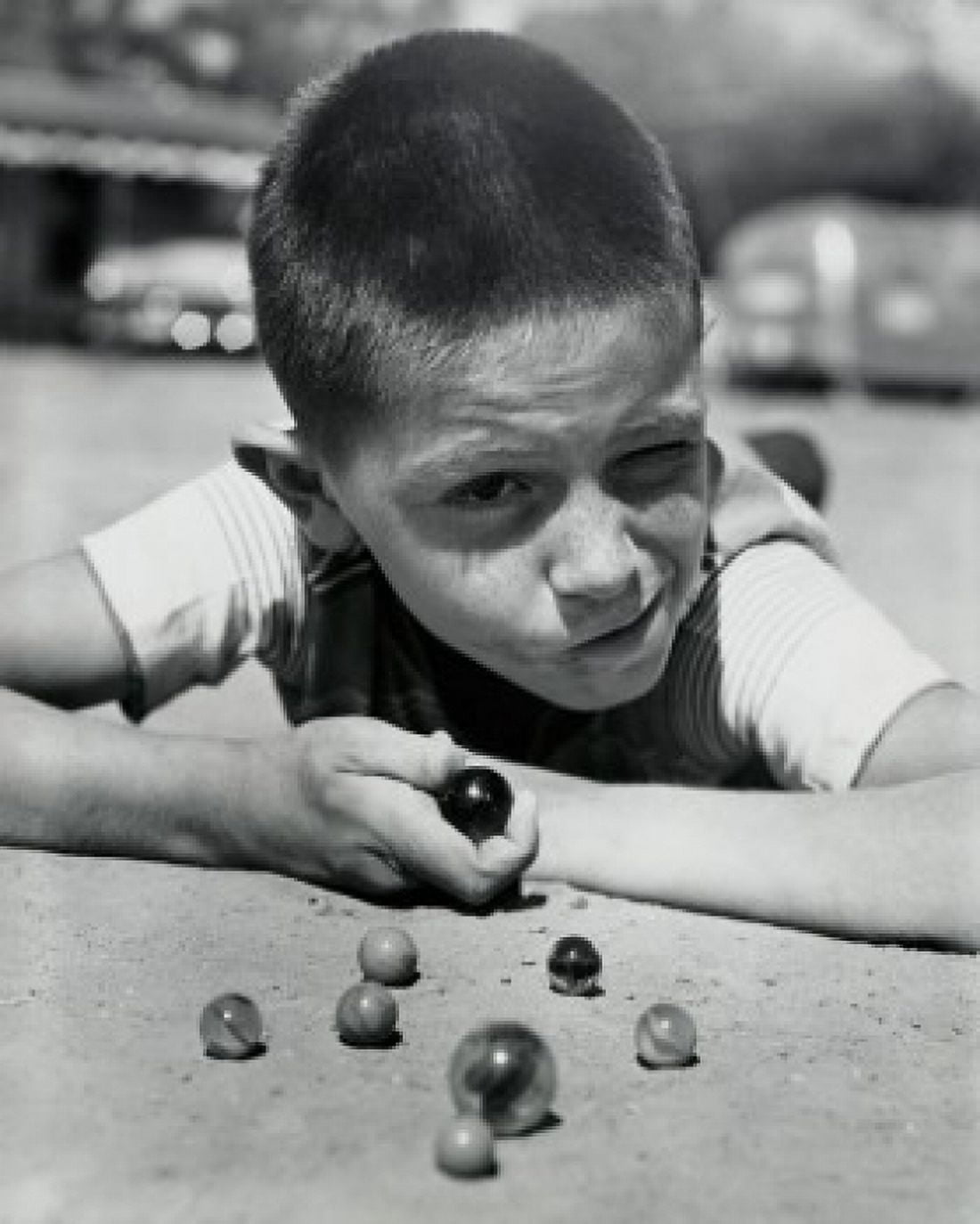 Close-up of a boy playing marbles Canvas Art - (18 x 24)
