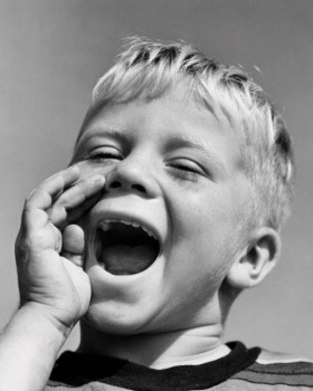 Close-up of a boy shouting with his hand near his mouth Canvas Art - (18 x 24)