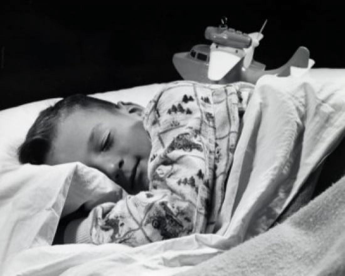 Close-up of a boy sleeping Canvas Art - (24 x 36)