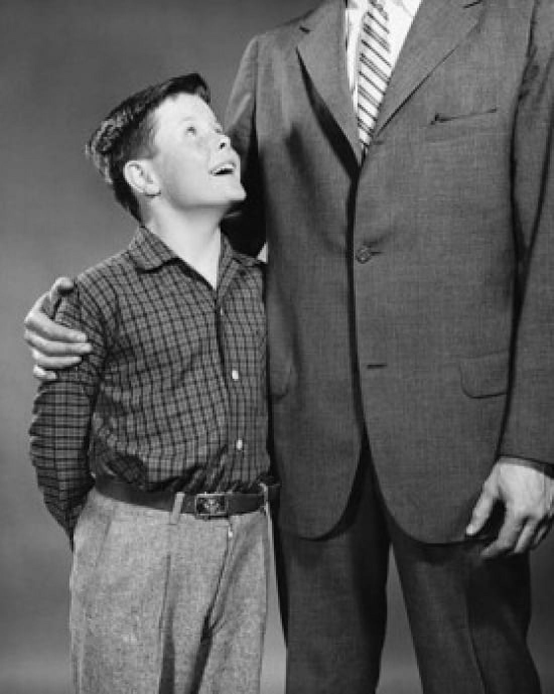 Close-up of a boy standing beside his father and smiling Canvas Art - (18 x 24)