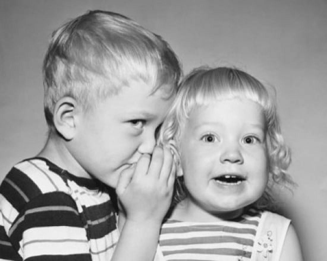 Close-up of a boy whispering to his sister Canvas Art - (24 x 36)