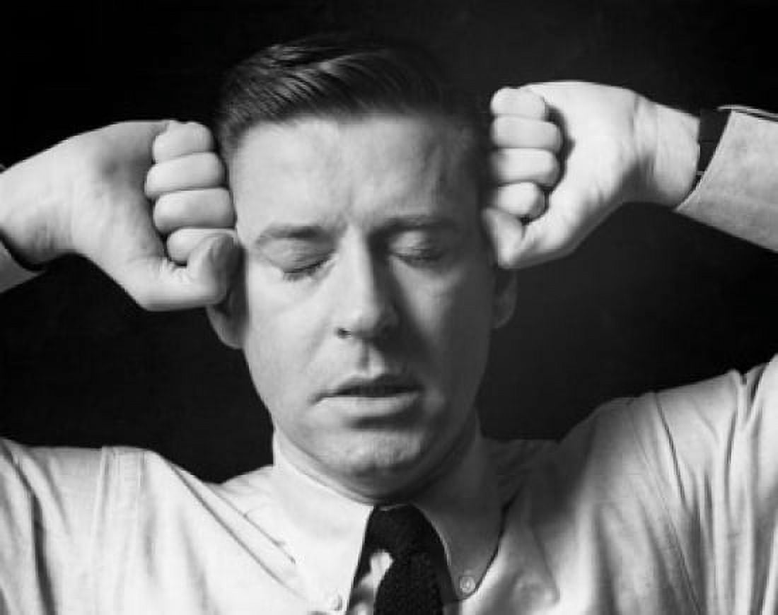 Close-up of a businessman holding his head Canvas Art - (24 x 36)