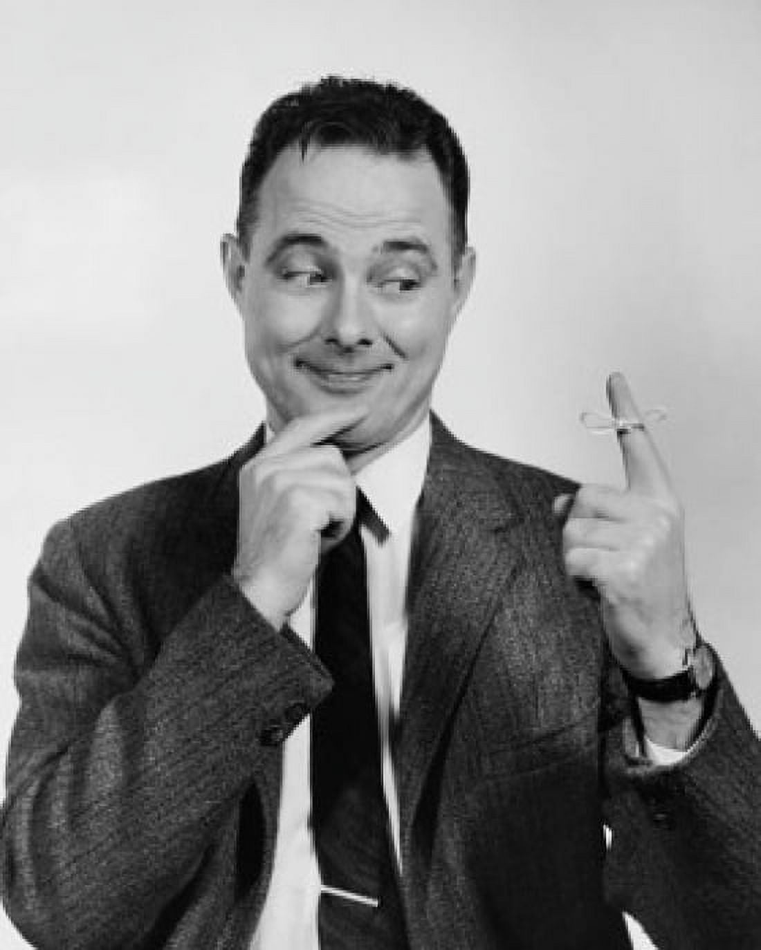 Close-up of a businessman looking at a string tied on his finger Canvas Art - (24 x 36)