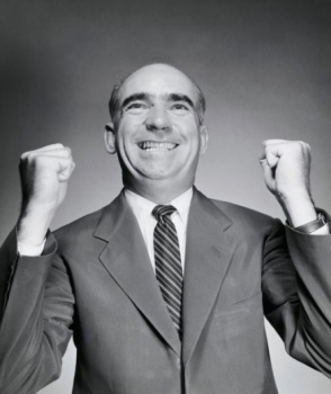 Close-up of a businessman smiling with his fists clenched Canvas Art - (18 x 24)