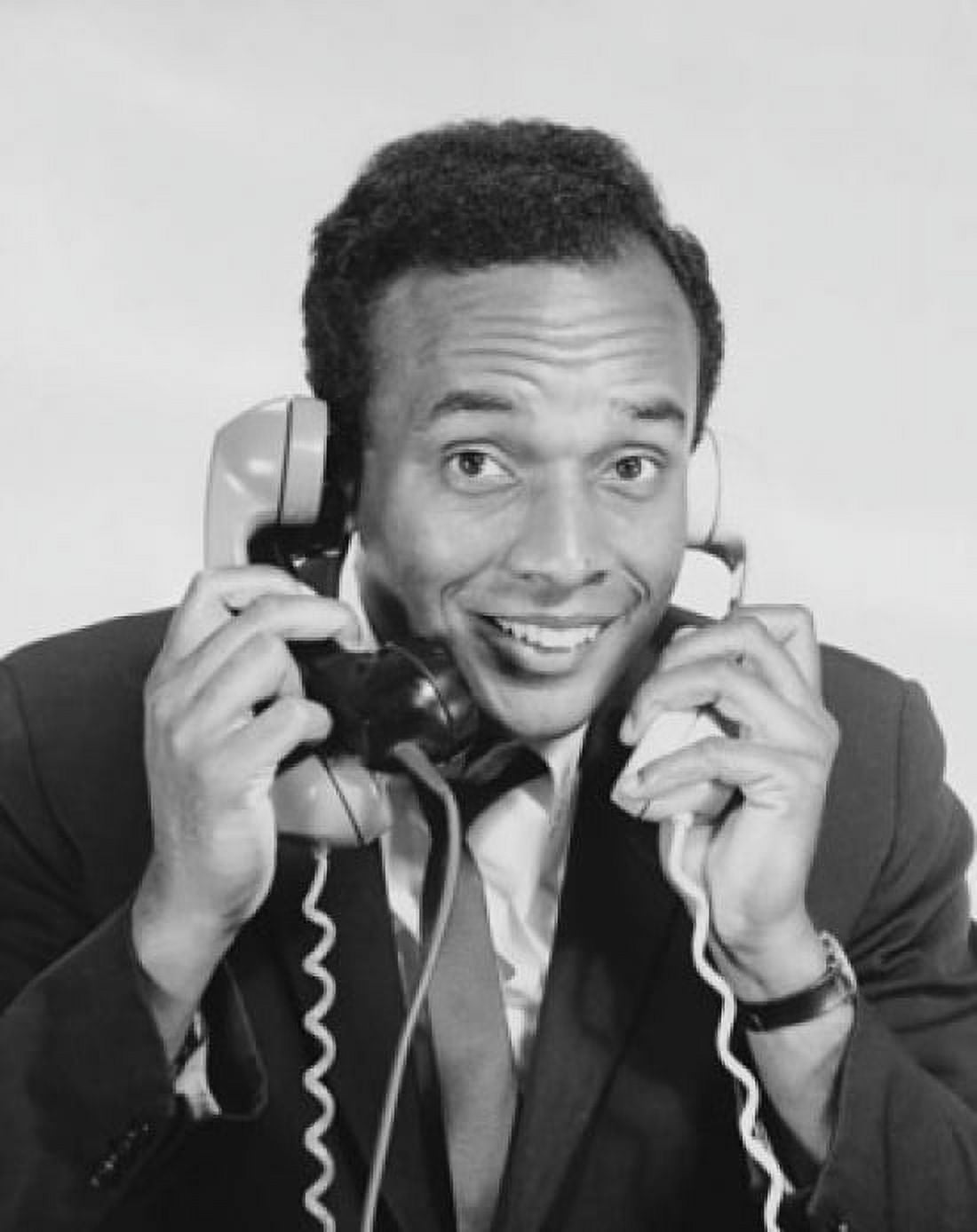 Close-up of a businessman using three telephones Canvas Art - (18 x 24)