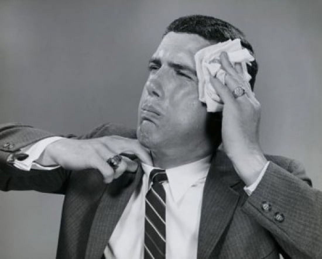 Close-up of a businessman wiping his face with a handkerchief Canvas Art - (24 x 36)