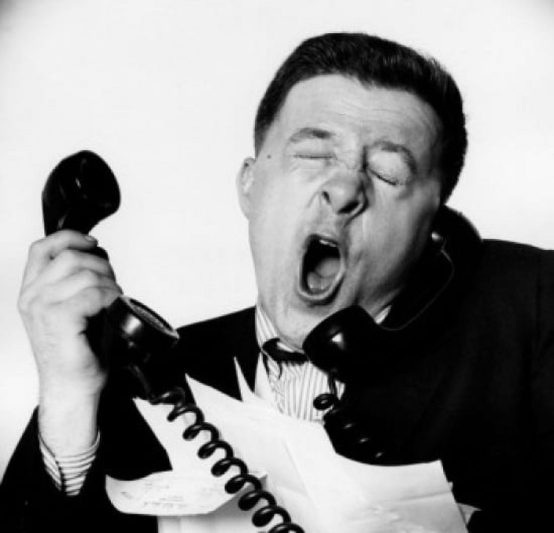 Close-up of a businessman yawning on the telephone Canvas Art - (24 x 36)