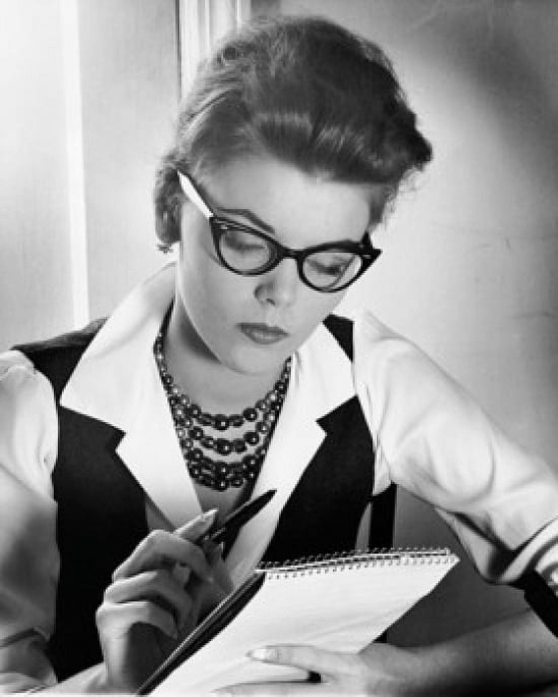 Close-up of a businesswoman holding a pen and a notepad Canvas Art - (18 x 24)