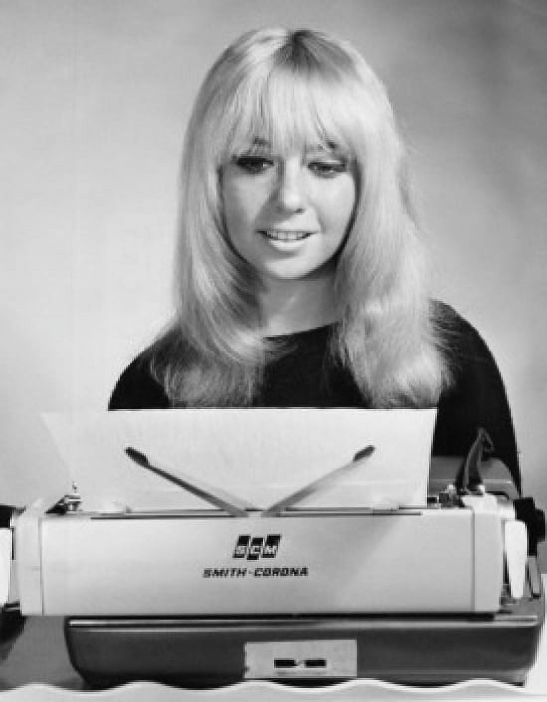 Close-up of a businesswoman typing a document on a typewriter Canvas Art - (18 x 24)