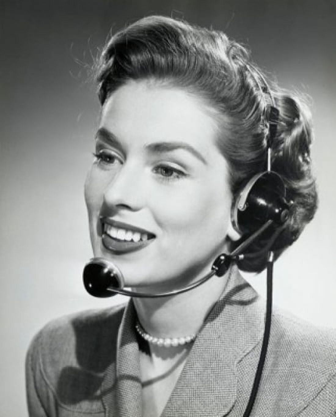Close-up of a businesswoman wearing a headset and smiling 1952 Canvas Art - (24 x 36)