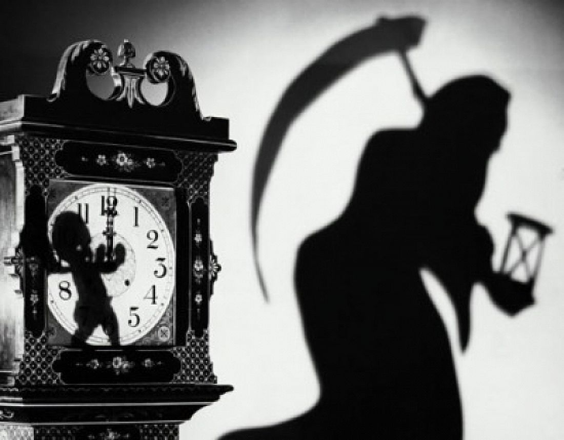 Close-up of a clock with the shadow of a person carrying a scythe Canvas Art - (24 x 36)