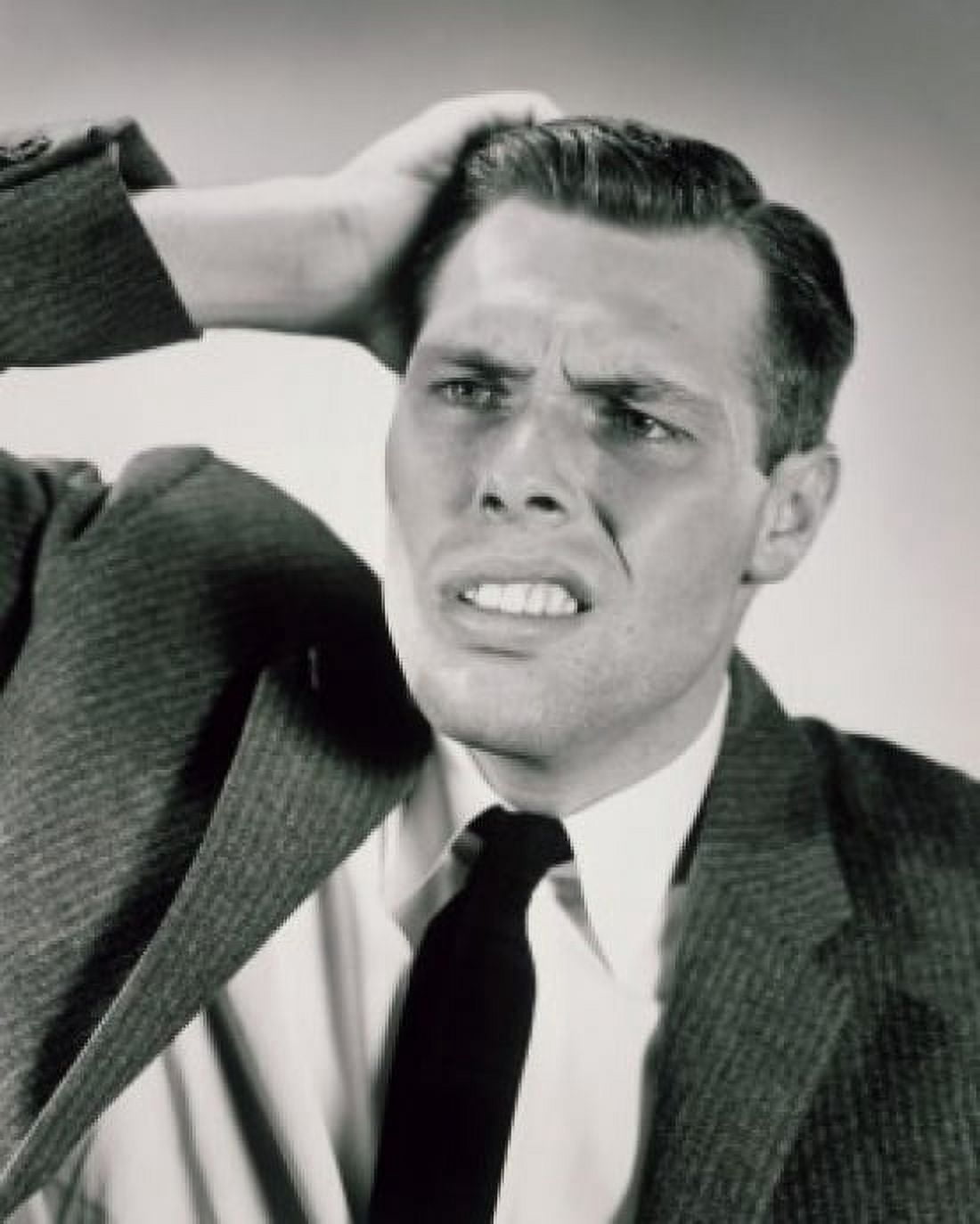 Close-up of a confused man Canvas Art - (24 x 36)