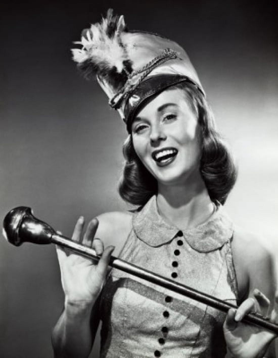 Close-up of a drum majorette holding a baton and smiling Canvas Art - (18 x 24)