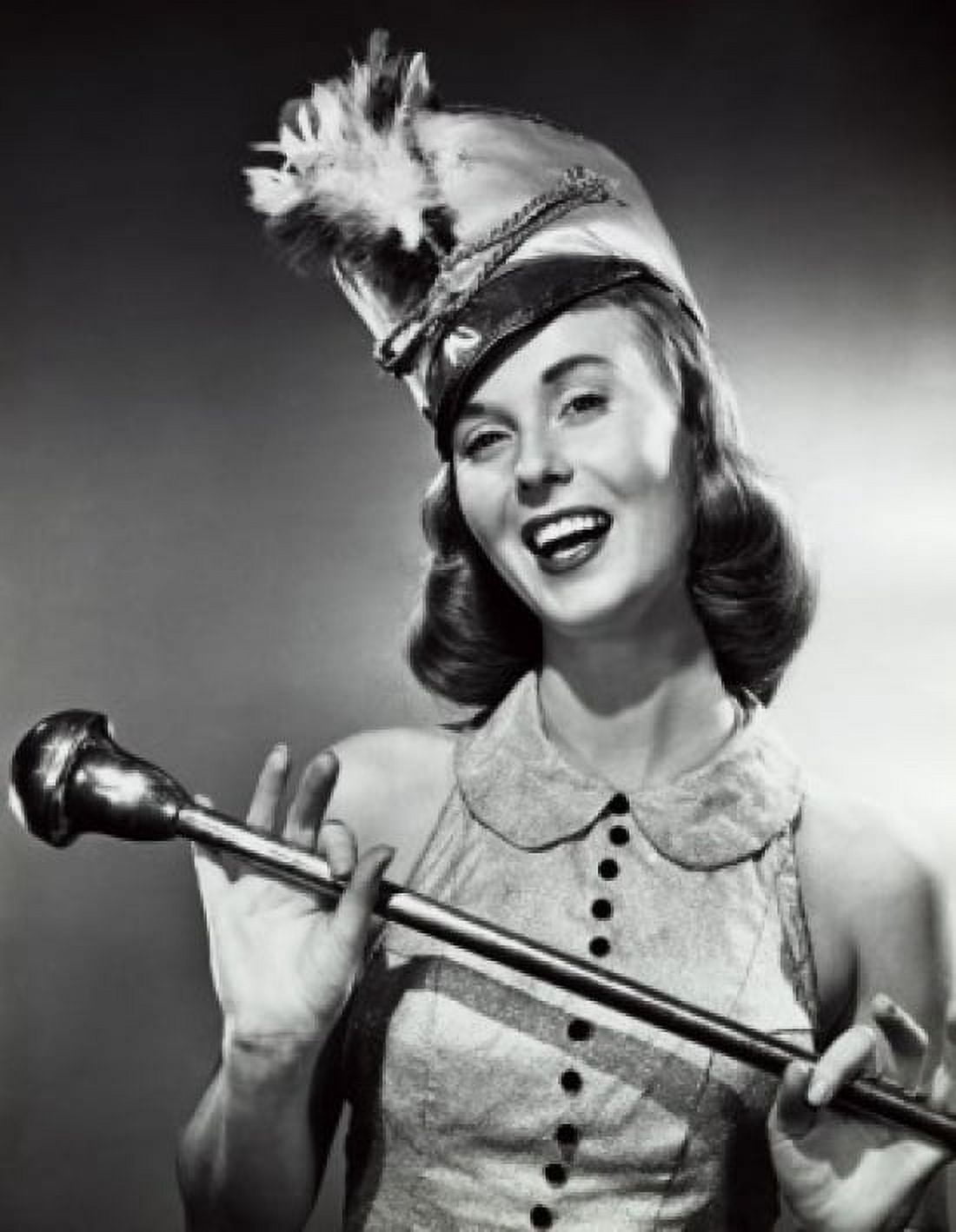 Close-up of a drum majorette holding a baton and smiling Canvas Art - (24 x 36)