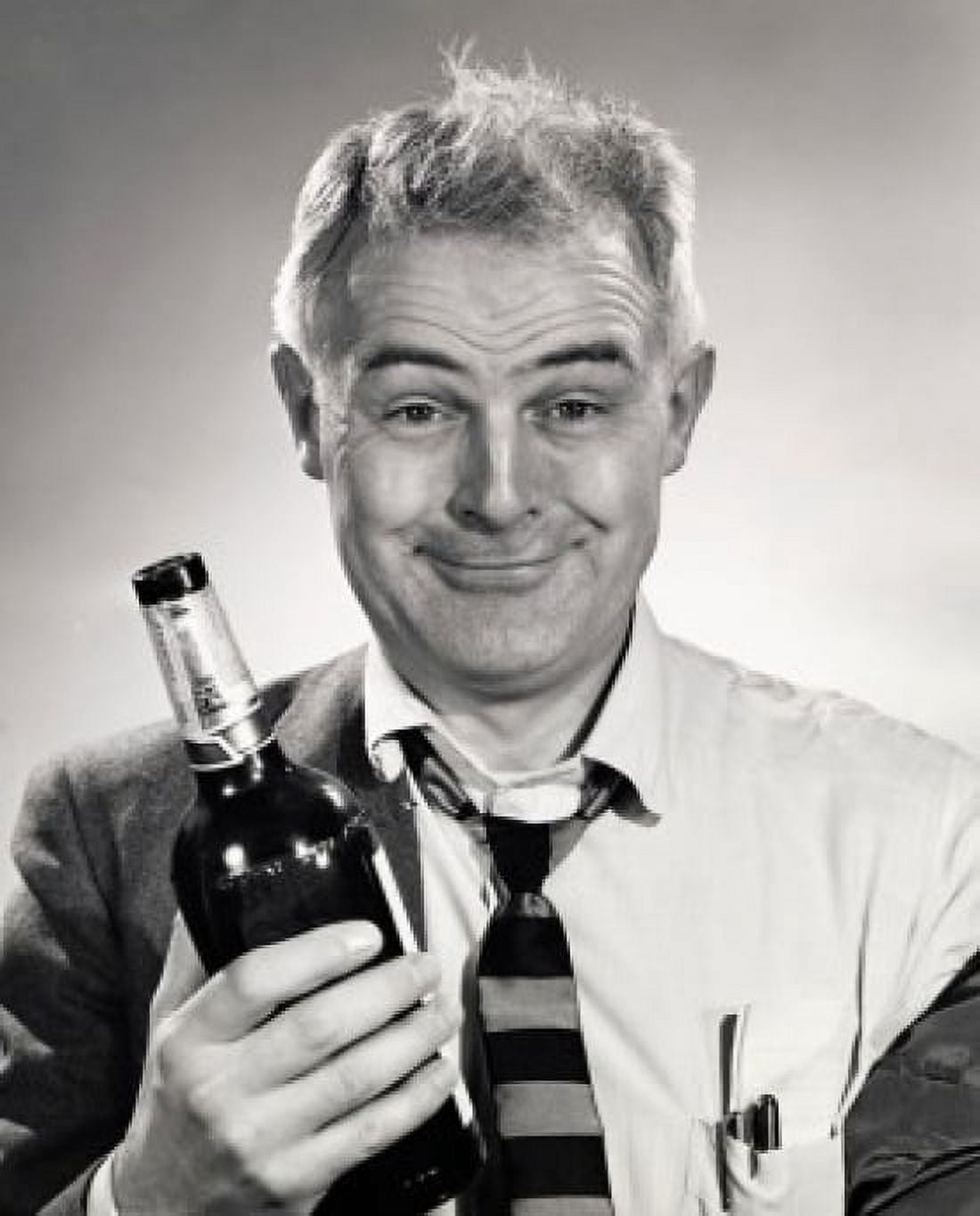 Close-up of a drunk senior man holding a alcohol bottle Canvas Art - (18 x 24)