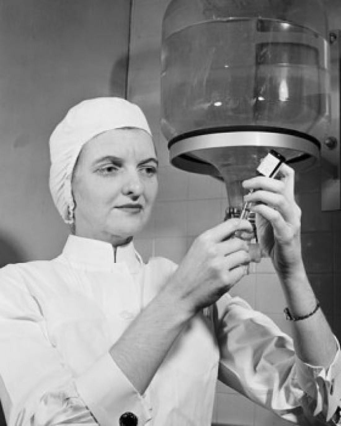 Close-up of a female nurse filling a syringe from a vial Canvas Art - (18 x 24)