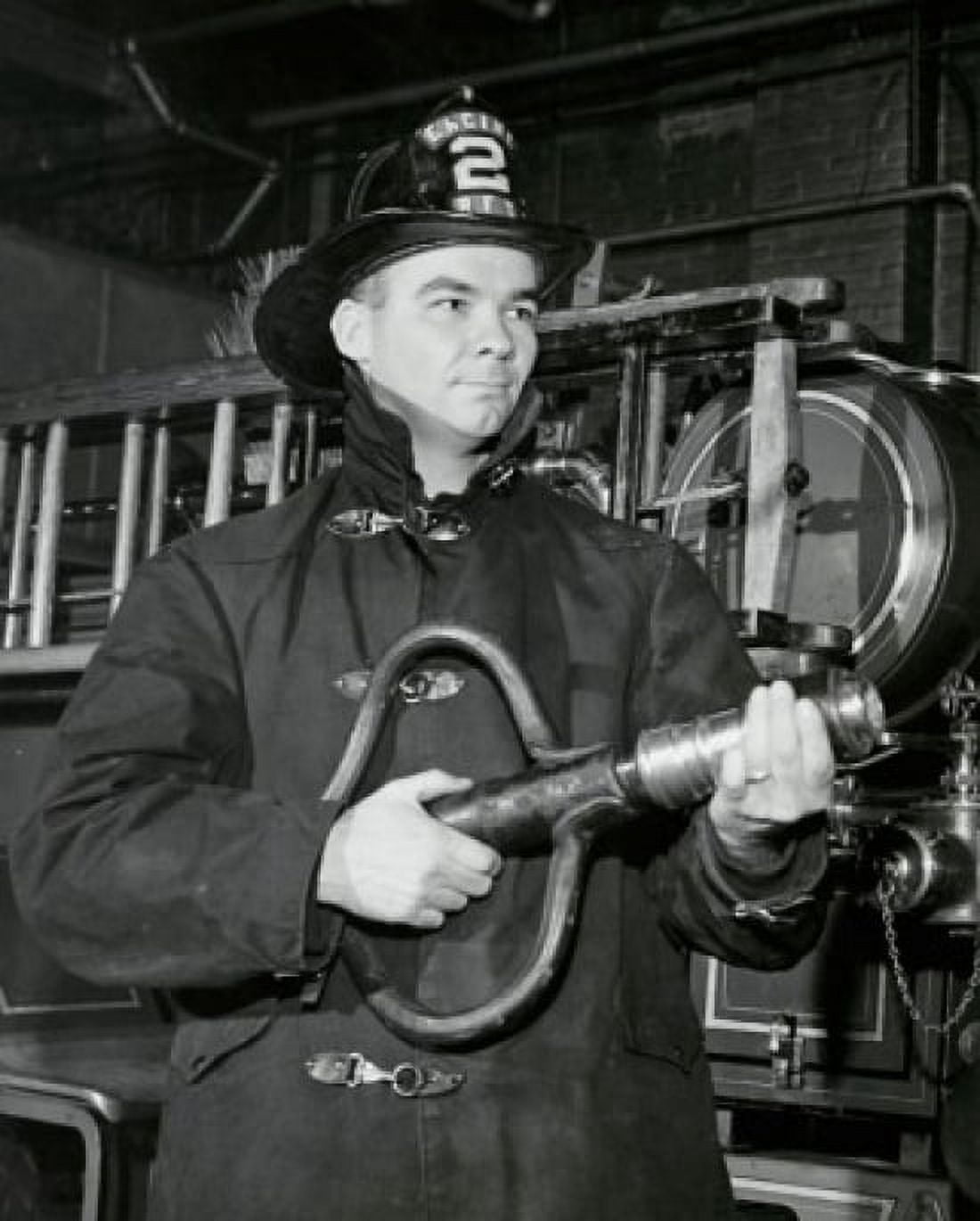 Close-up of a firefighter holding a fire hose Canvas Art - (18 x 24)