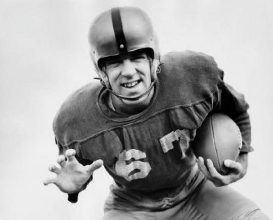 Close-up of a football player holding a football Canvas Art - (24 x 36)