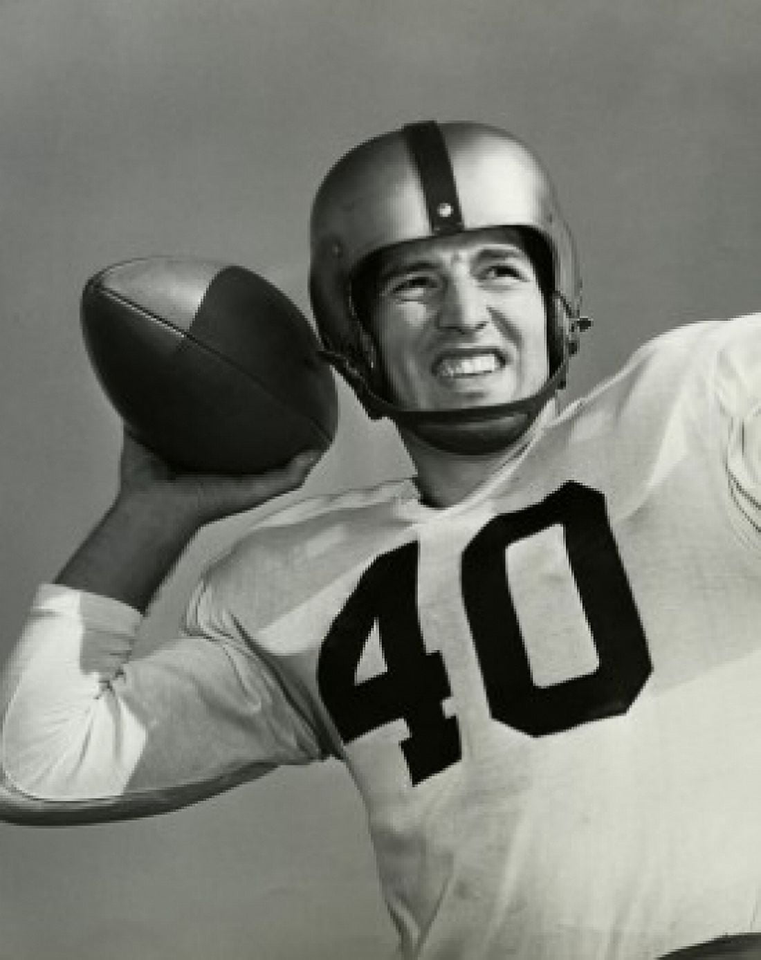 Close-up of a football player throwing a football Canvas Art - (18 x 24)