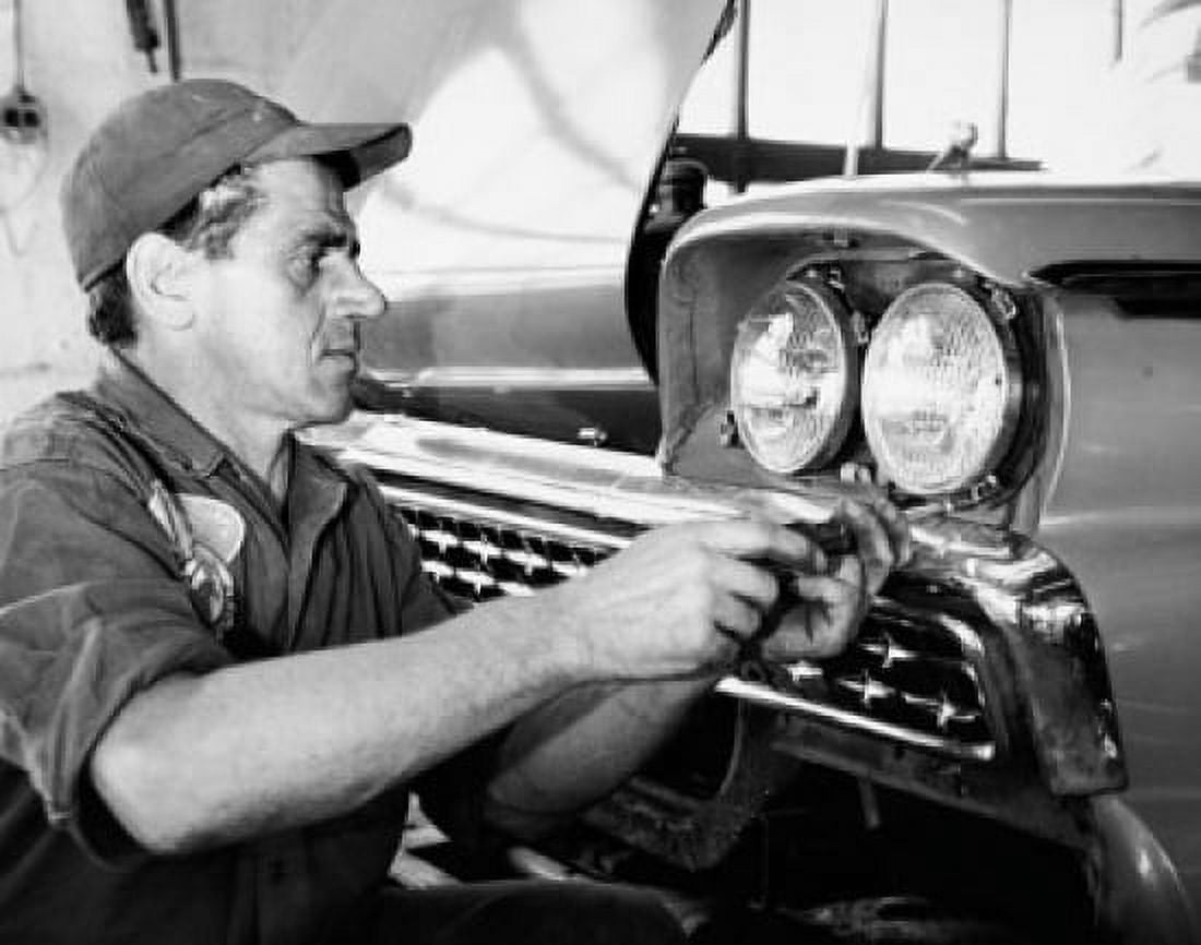 Close-up of a gas station attendant adjusting headlight of a car Canvas Art - (18 x 24)