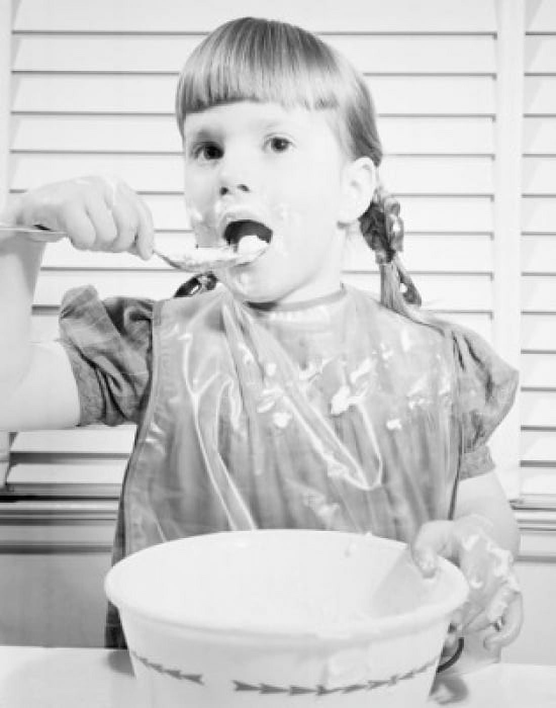 Close-up of a girl eating Canvas Art -  (24 x 36)