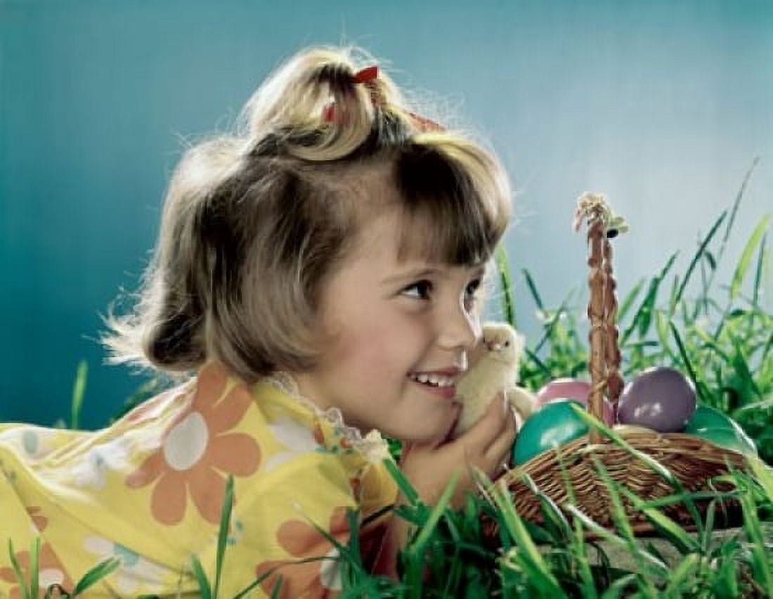 Close-up of a girl holding a chick and smiling Canvas Art - (18 x 24)