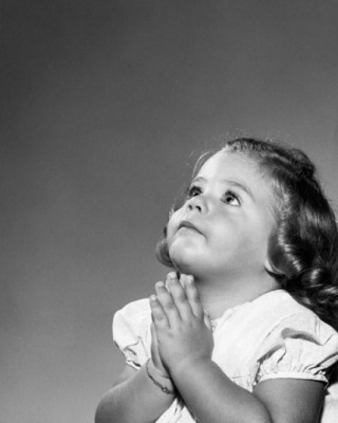 Close-up of a girl praying Canvas Art - (18 x 24)
