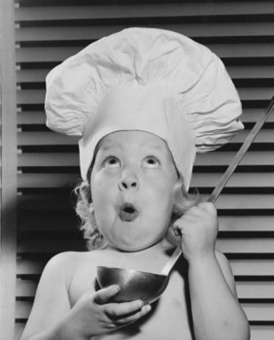 Close-up of a girl pretending to be a chef and holding a ladle Canvas Art - (18 x 24)