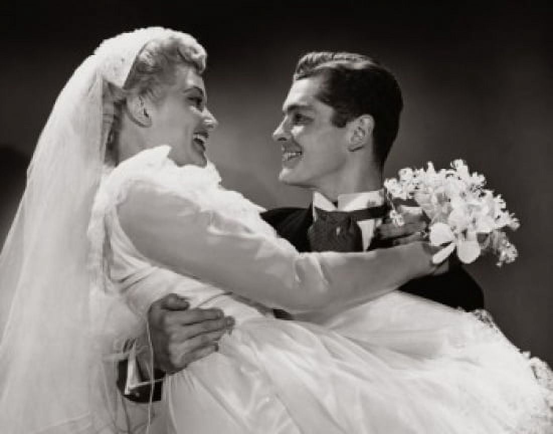 Close-up of a groom carrying his bride and smiling Canvas Art - (18 x 24)