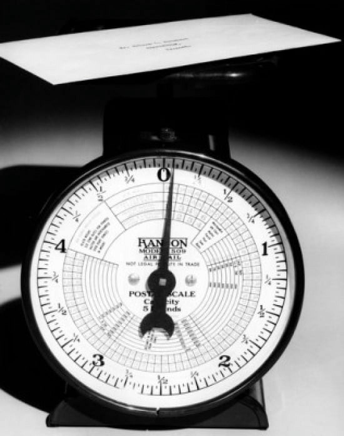 Close-up of a letter on a weight scale Canvas Art - (18 x 24)