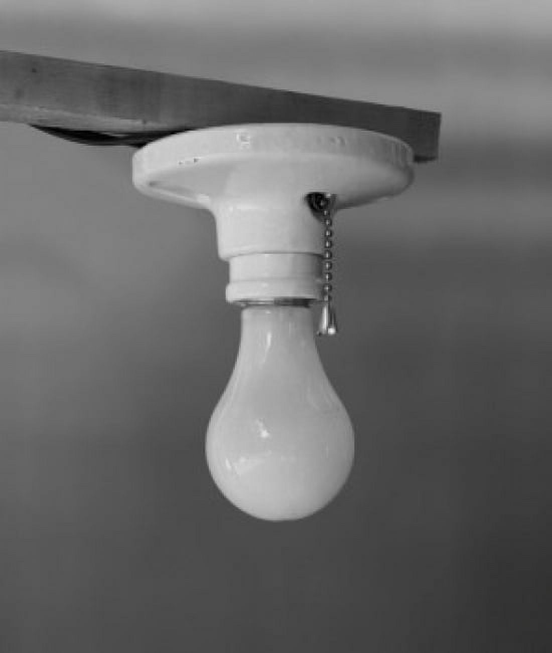 Close-up of a lit light bulb Canvas Art - (24 x 36)