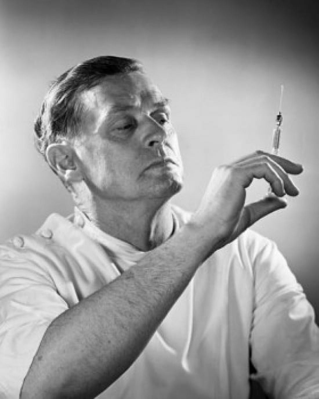Close-up of a male doctor holding a syringe Canvas Art - (24 x 36)