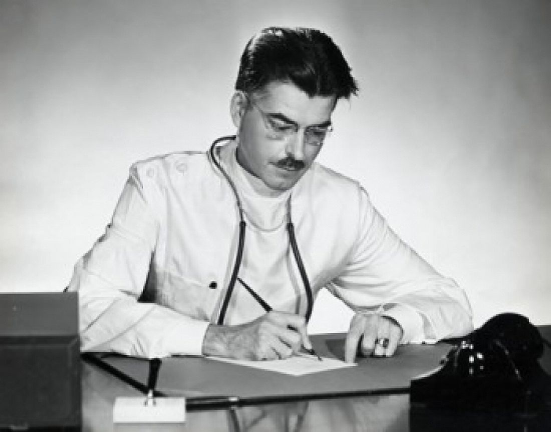 Close-up of a male doctor writing on a sheet of paper Canvas Art - (24 x 36)