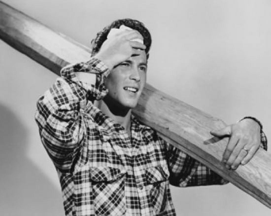 Close-up of a man carrying a plank on his shoulder Canvas Art - (18 x 24)
