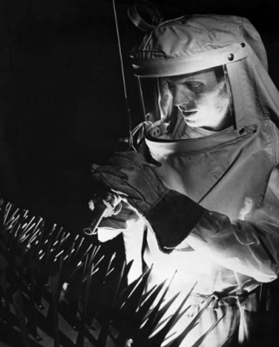 Close-up of a man cleaning surface dirt from an jet engine Canvas Art - (18 x 24)