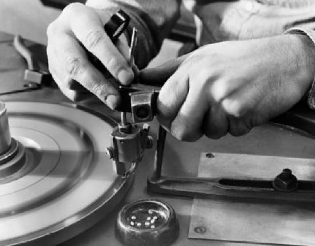 Close-up of a mans hand adjusting a diamond cutter machine Canvas Art -  (18 x 24)