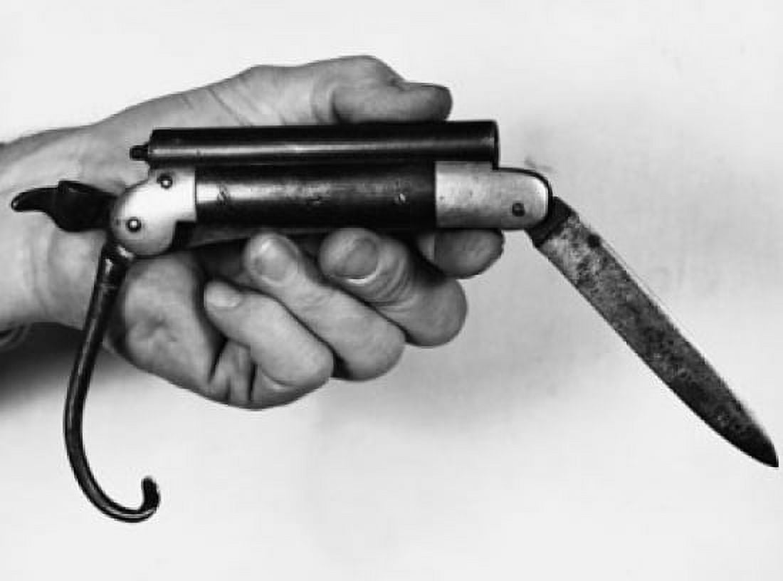 Close-up of a mans hand holding a Knife-Percussion Pistol combination weapon 1850 Canvas Art - (18 x 24)