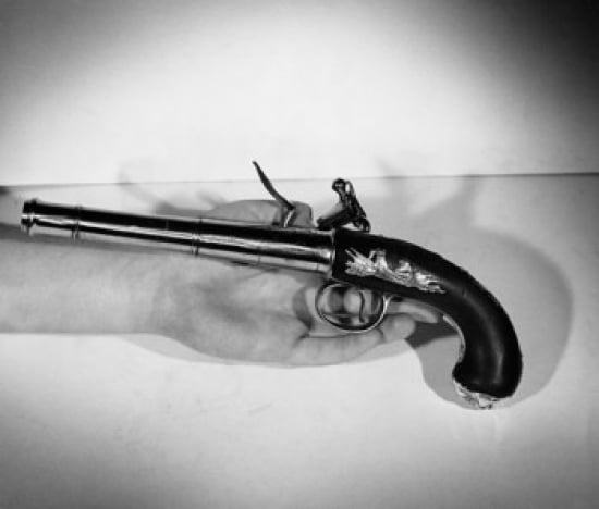 Close-up of a mans hand holding a flintlock pistol Canvas Art - (18 x 24)