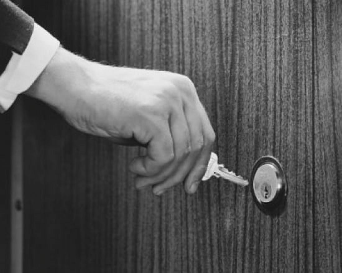 Close-up of a mans hand opening a lock with a key Canvas Art -  (18 x 24)