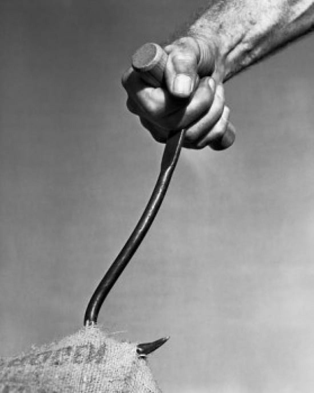 Close-up of a mans hand pulling a sack by a hook Canvas Art - (24 x 36)