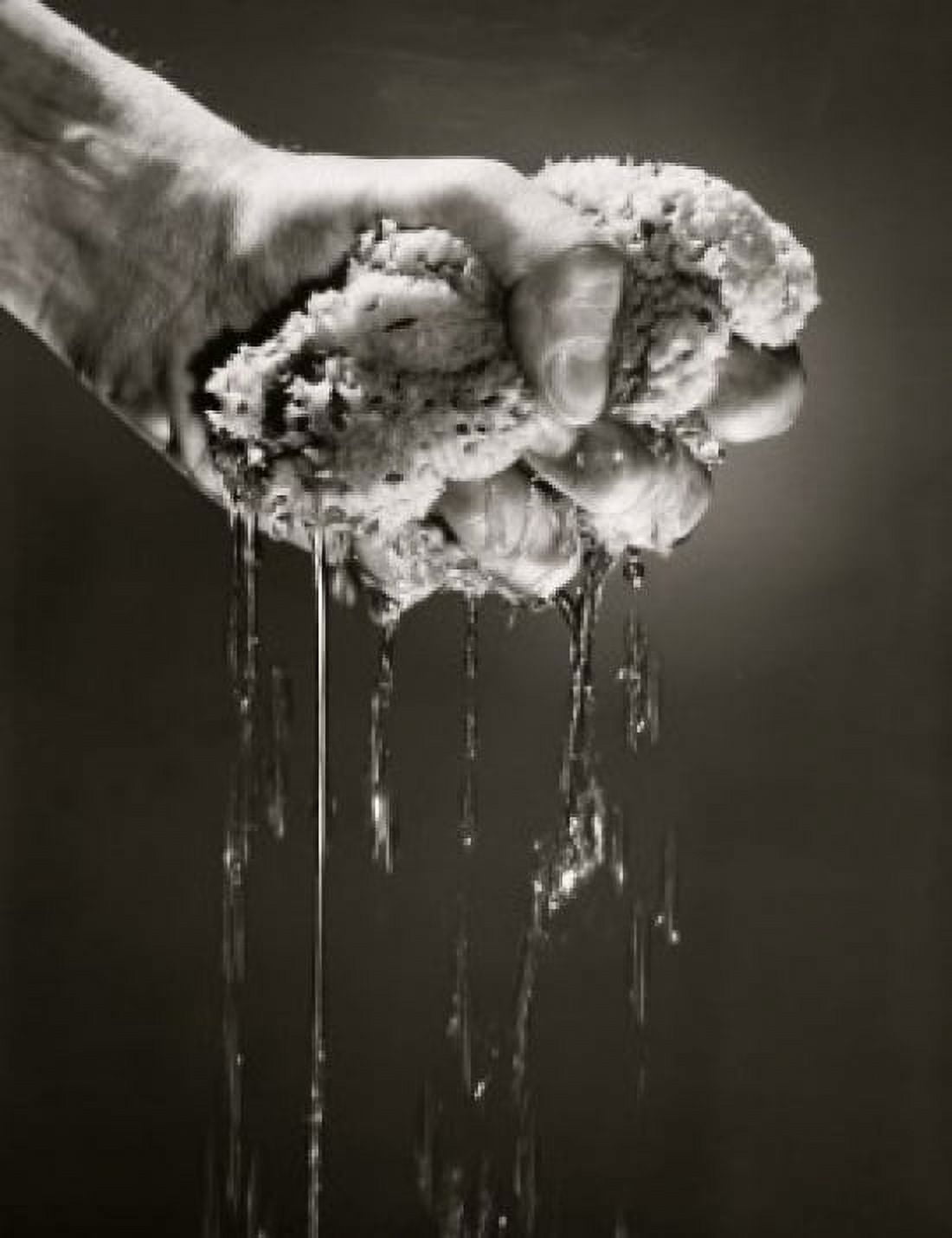 Close-up of a mans hand squeezing sponge Canvas Art - (18 x 24)