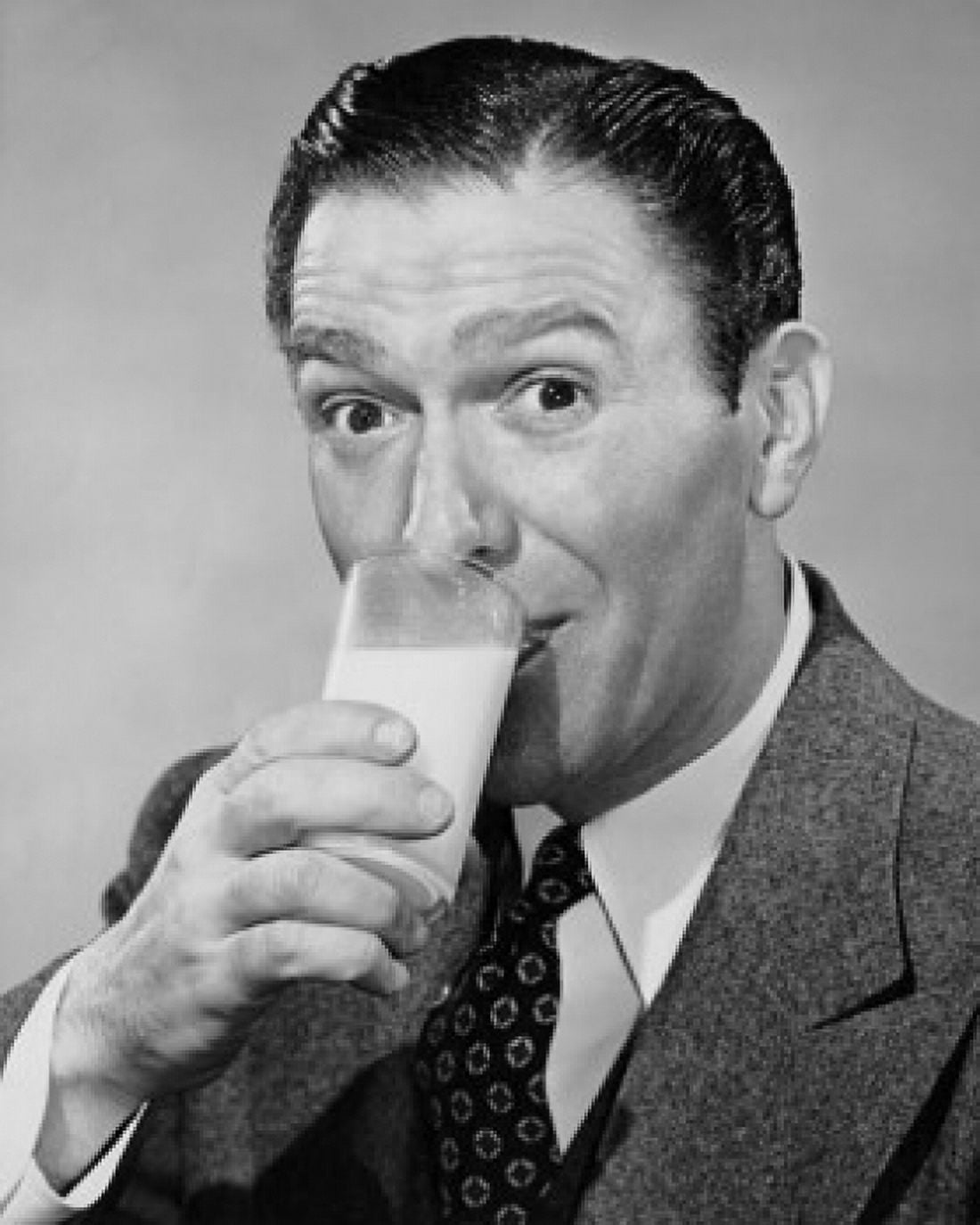 Close-up of a mature man drinking milk Canvas Art - (24 x 36)