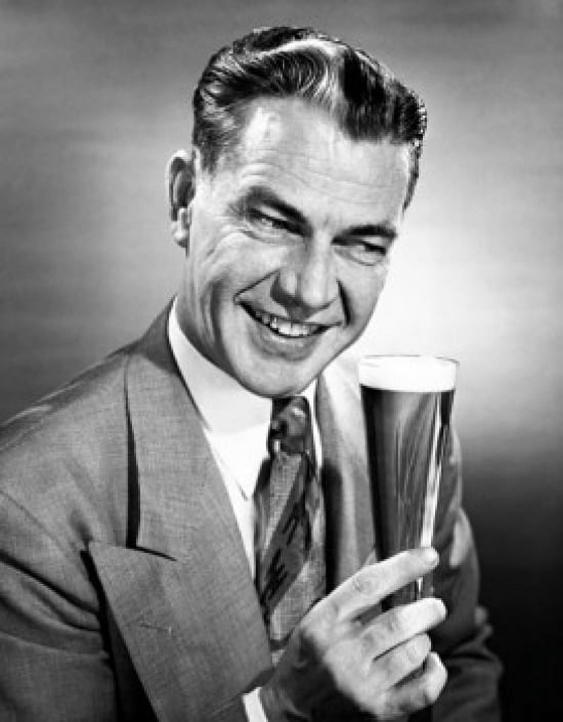 Close-up of a mature man holding a glass of beer Canvas Art - (18 x 24)