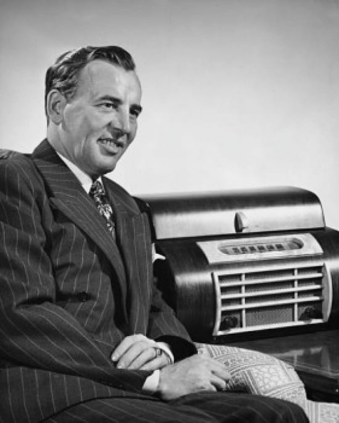 Close-up of a mature man listening to the radio Canvas Art - (24 x 36)