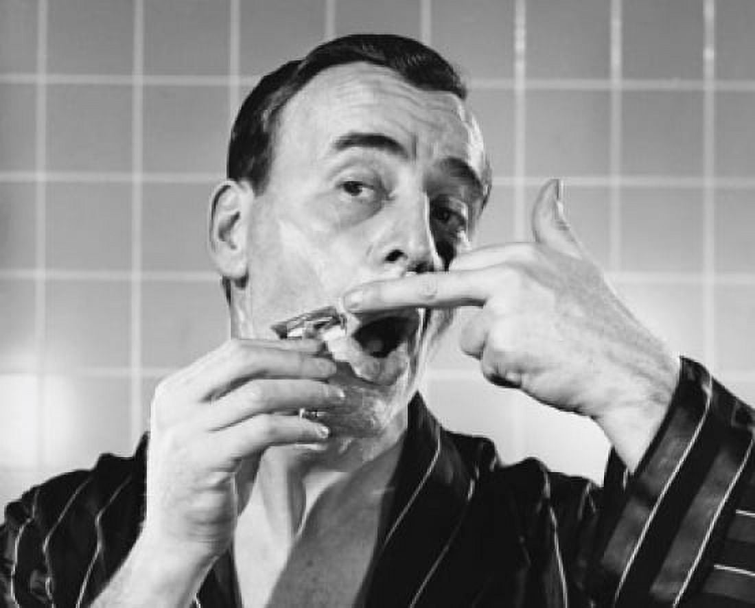 Close-up of a mature man shaving Canvas Art - (18 x 24)